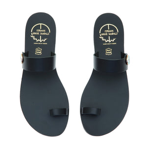 Black leather sandals with evil eye motif embellishment