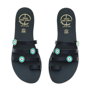 Black leather sandals with evil eye embellishments